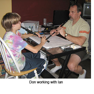 Don working with Ian